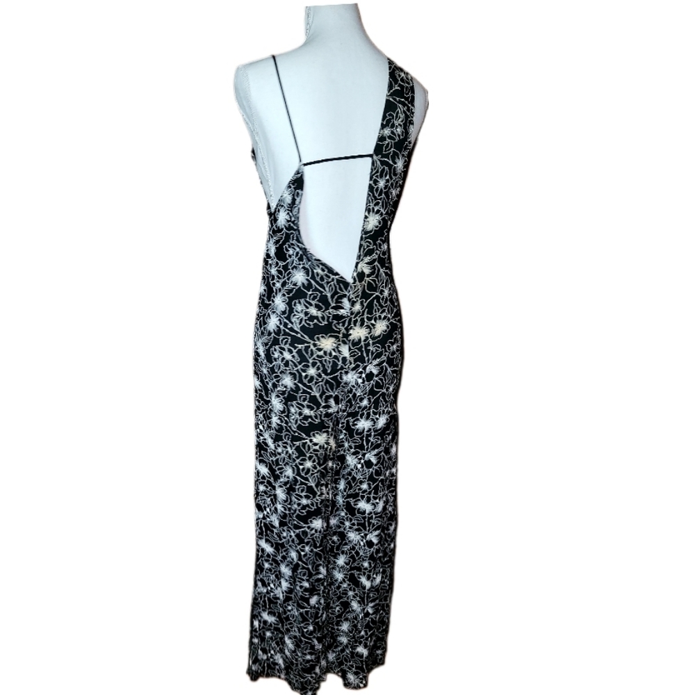 Reformation asymmetrical   Jumpsuit w thigh high slits s - m